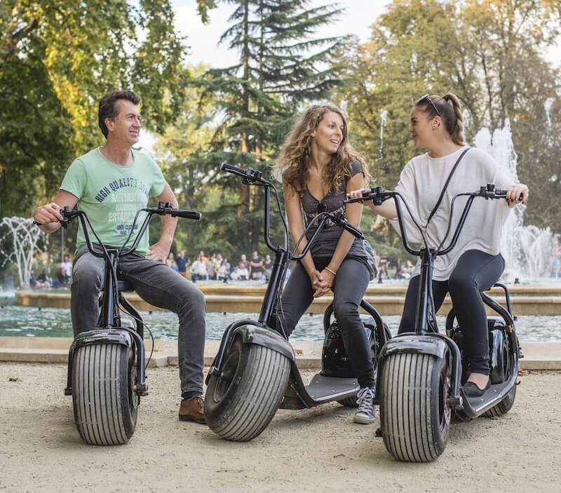 E-scooter Budapest family having a good time on our monsteroller