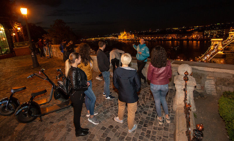 Stunning view from Buda Castle during a night tour on MonsteRoller escooters.