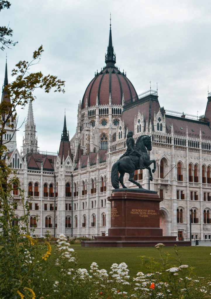 Beautiful architecture and green spaces on your way to the Hungarian Parliament Building.