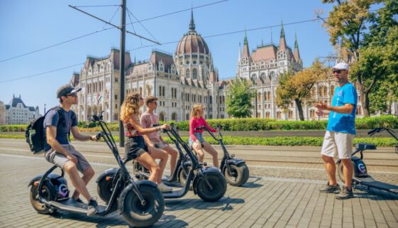 A group of tourists on a guided tour in Budapest.