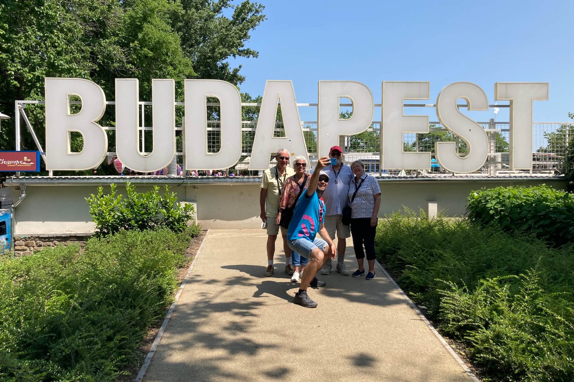 Taking a photo in front of the giant Budapest sign on Margaret Island.