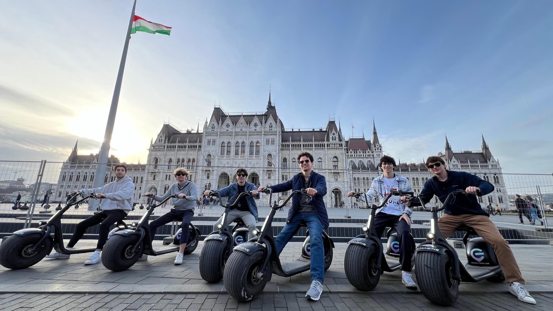 escooters in front of the parliament in Budapest, Hungary